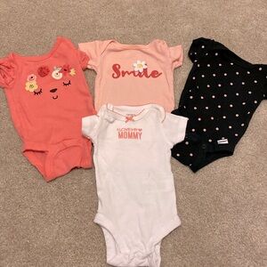 4 pack assorted newborn short sleeved onesies